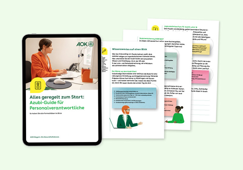 Azubi-Guide Das Titelblatt des Azubi-Guides zeigt eine Frau im orangefarbenen Blazer, die am Schreibtisch sitzt und am Computer arbeitet.