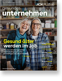 Auf dem Cover des Magazins gesundes unternehmen sind zwei lachende Frauen mittleren Alters zu sehen.