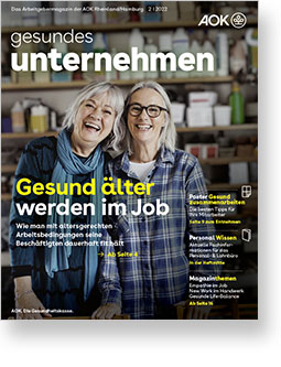 Auf dem Cover des Magazins gesundes unternehmen sind zwei lachende Frauen mittleren Alters zu sehen.