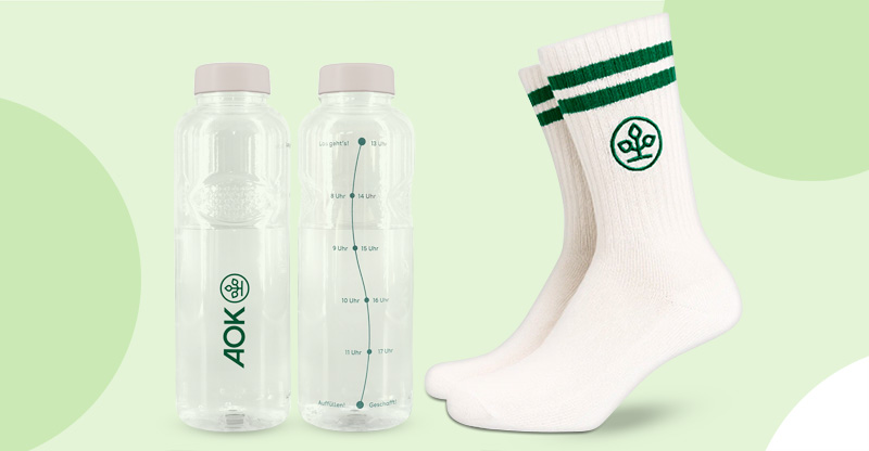 Das Dankeschön für Ihre Teilnahme AOK-Tennissocken und eine Trinkflasche mit Trinkuhr als Dankeschön