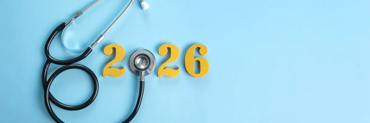 Zu sehen ist die Jahreszahl 2026. Die Null wird durch das Bruststück eines Stethoskops dargestellt.