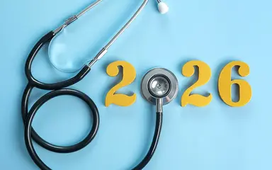 Zu sehen ist die Jahreszahl 2026. Die Null wird durch das Bruststück eines Stethoskops dargestellt.