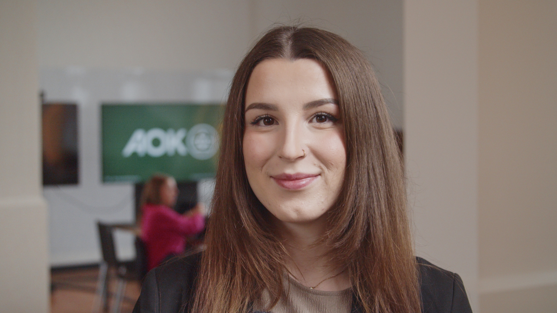 Porträtfoto der Quereinsteigerin Michelle (Industriekauffrau).