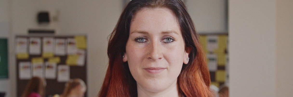 Porträtfoto der Quereinsteigerin (MFA) Michelle.