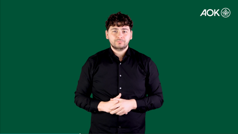Ein Standbild des Gebärdendolmetschers aus dem Video zur Benutzung der AOK-Karriereseite