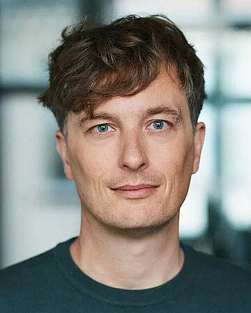 Foto: Portr&auml;t von Dr. Chris Methmann, Gesch&auml;ftsf&uuml;hrer von foodwatch Deutschland.
