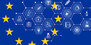 Foto: Neun der zw&ouml;lf goldenen Europasterne sind auf blauem Grund zu sehen, dahinter visualisiert Symbole f&uuml;r die Digitalisierung von Gesundheitsdaten.