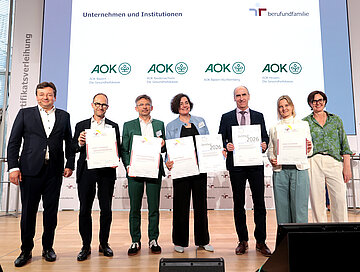 Die Sondergruppe der AOK steht auf dem Podium