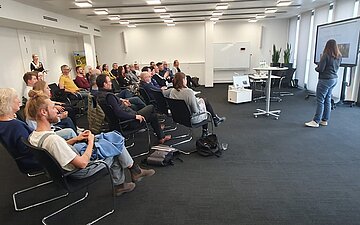 Publikum bei einer Veranstaltung des Nachhaltigkeitsnetzwerks Bodensee-Oberschwaben