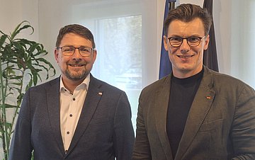 Doppelporträt von Andreas Schneider und Kai Whittaker