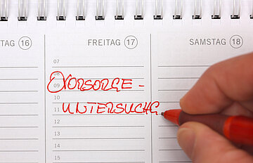 Ein Vorsorgetermin wird in einen Kalender eingetragen. 