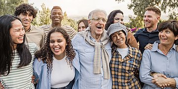 Glück Foto: Eine lachende Menschengruppe