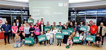 Die Vertreterinnen und Vertreter der lauffreudigsten Schulen in Westfalen-Lippe bei der Ehrungsveranstaltung.