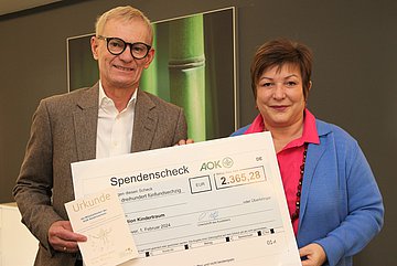 Foto Scheck-Uebergabe
