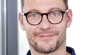 Das Portr&auml;tfoto zeigt Martin Hu&szlig;ing.