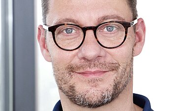 Das Portr&auml;tfoto zeigt Martin Hu&szlig;ing.
